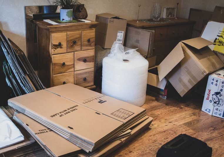 A house during the process of moving, with items packaged up for movers or removals to take during a house move.
